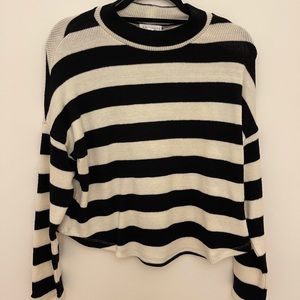 SOCALITE stripped knit sweater. Black and cream colors. Sized Medium